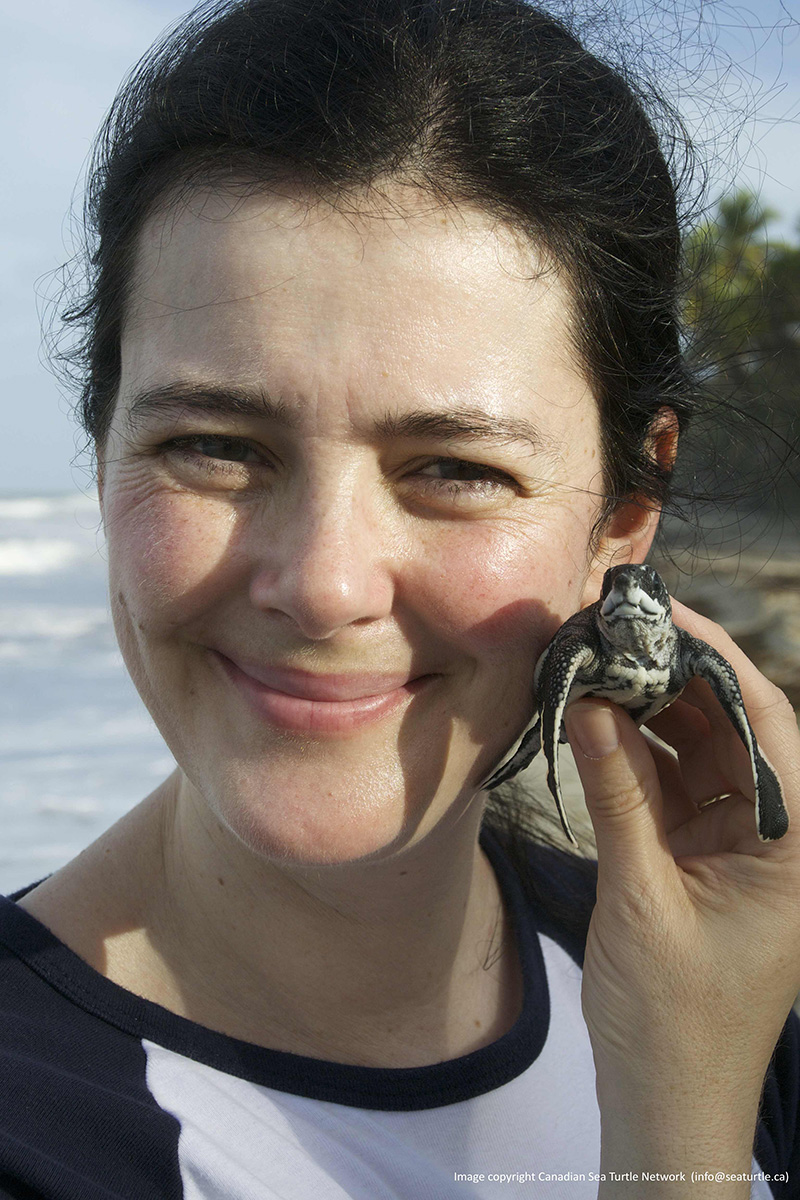 Me (Kathleen Martin) with a hatchling leatherback.