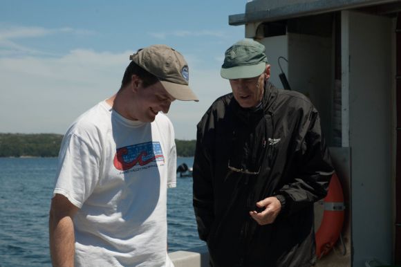 Mike James (left) and Nicholas Mrosovsky on the sea turtle boat.
